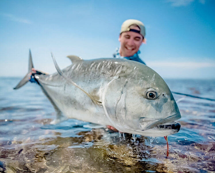 Super happy man caught giant trevally caught ion a flaming lamborghini fly with Alphonse Fishing Co™